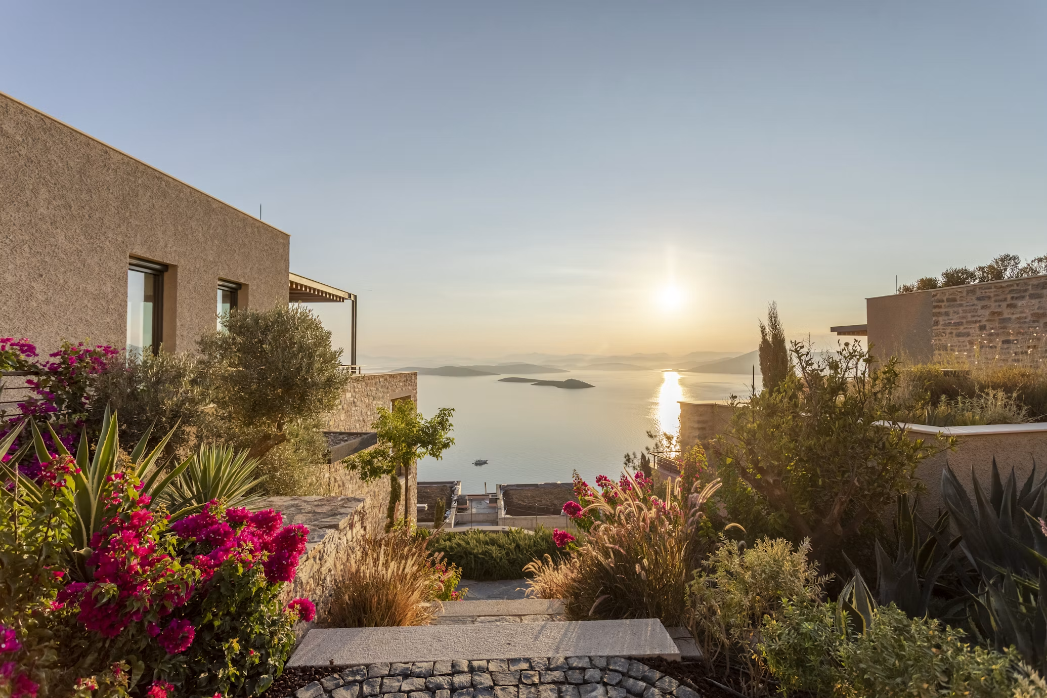 Sunset over the sea from a Bodrum hillside garden