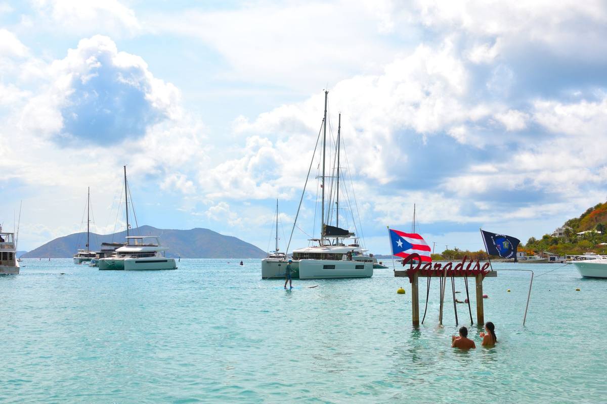 Catamarans in a sheltered bay off Tortola