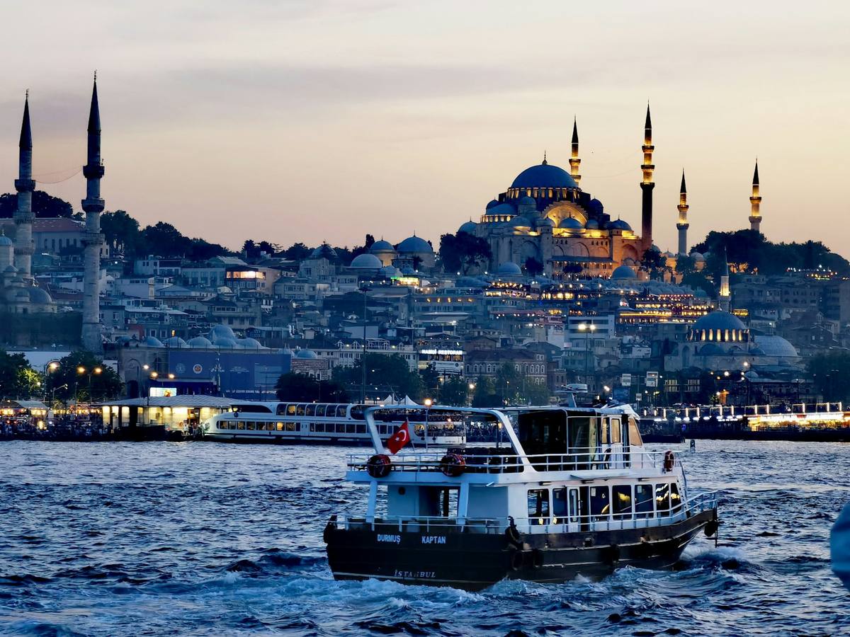 A ferry crossing the Bosphorus below the old city